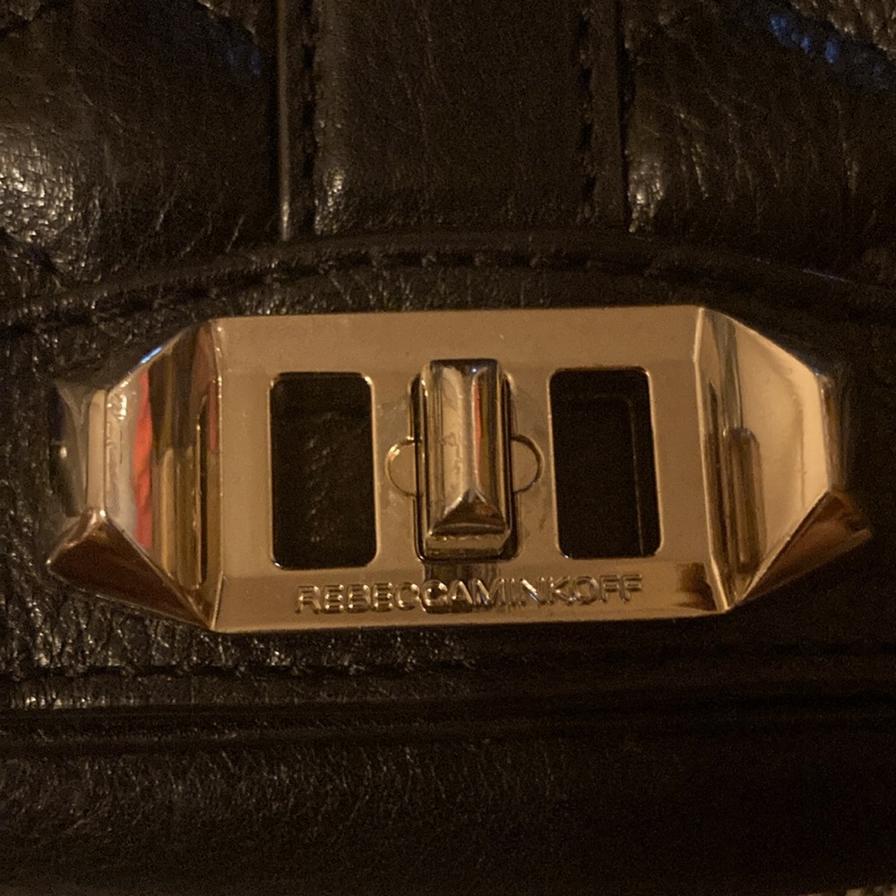 Love bag. Quilted black with gold hardware. Great condition.  10”x6”x3.5”